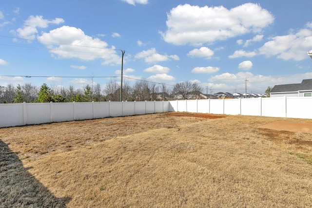 view of yard featuring a fenced backyard