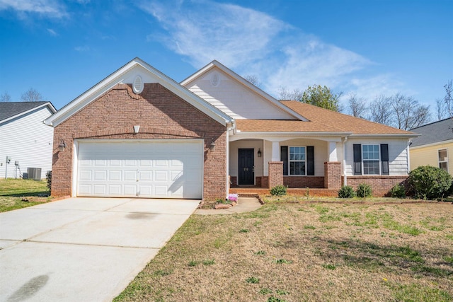 view of front of property featuring brick siding, central AC, a garage, and concrete driveway