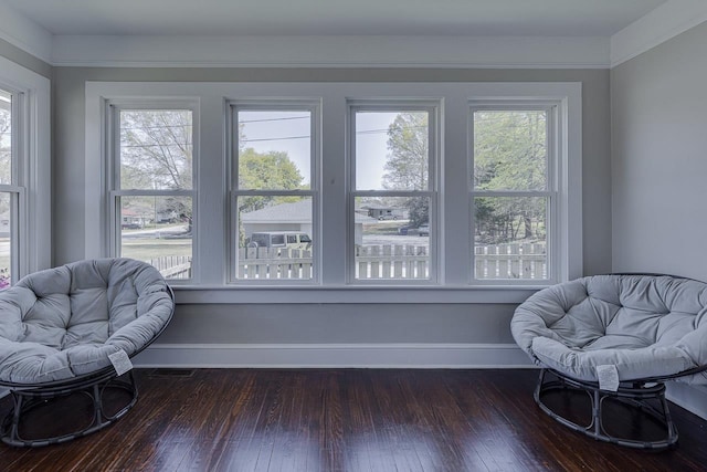 353 E Georgia, Woodruff, SC 29388 - living area featuring baseboards, a wealth of natural light, and dark wood finished floors