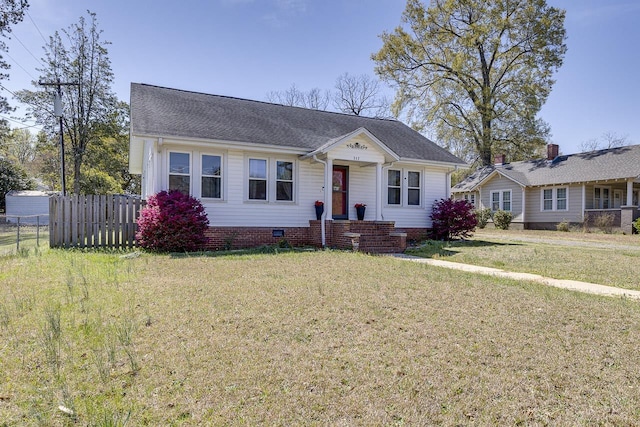 353 E Georgia, Woodruff, SC 29388 - bungalow-style home with crawl space, a front yard, fence, and roof with shingles