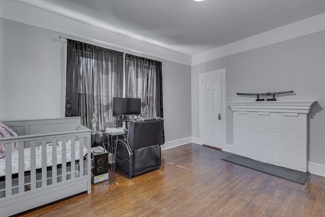 353 E Georgia, Woodruff, SC 29388 - bedroom featuring hardwood / wood-style floors and baseboards