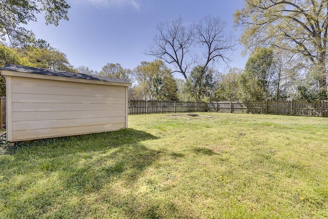 353 E Georgia, Woodruff, SC 29388 - view of yard with an outbuilding, a fenced backyard, and a shed