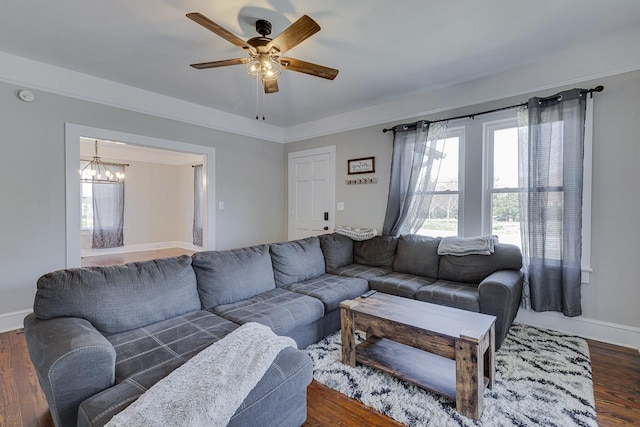353 E Georgia, Woodruff, SC 29388 - living room featuring ceiling fan with notable chandelier, baseboards, and wood finished floors