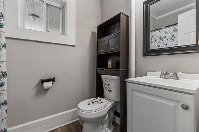 121 Holland, Gaffney, SC 29341 - full bath with vanity, toilet, ornamental molding, baseboards, and wood finished floors