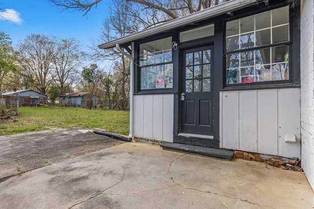 121 Holland, Gaffney, SC 29341 - entrance to property featuring a patio area, a lawn, and fence