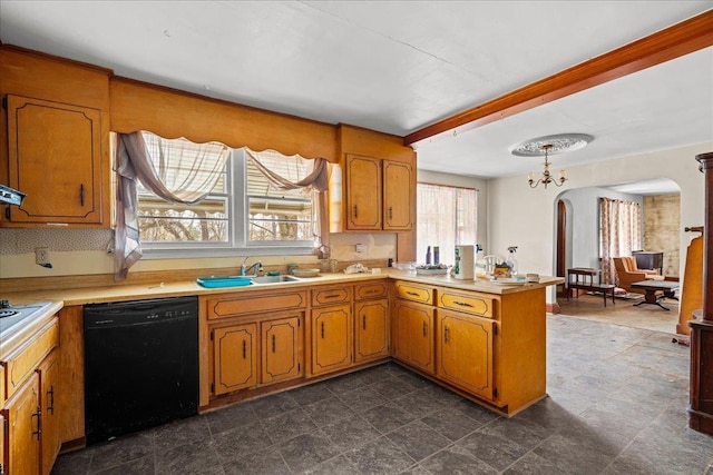 239 Phillips, Greenville, SC 29609 - kitchen with light countertops, a sink, arched walkways, black dishwasher, and a peninsula