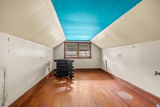 239 Phillips, Greenville, SC 29609 - bonus room featuring baseboards, vaulted ceiling, and hardwood / wood-style flooring