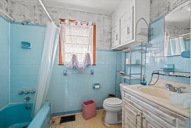 239 Phillips, Greenville, SC 29609 - full bathroom with vanity, shower / tub combo, tile walls, toilet, and visible vents