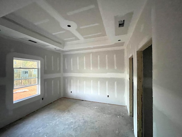 spare room featuring concrete flooring