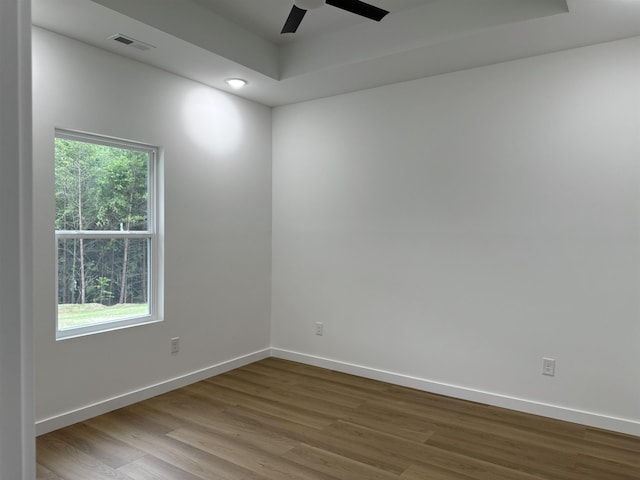 732 Corn Ml, Cowpens, SC 29330 - unfurnished room with a ceiling fan, wood finished floors, baseboards, recessed lighting, and a raised ceiling