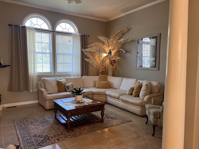 tiled living area featuring baseboards, ornamental molding, and visible vents