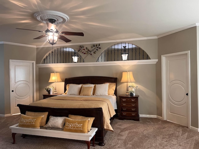 bedroom featuring baseboards, ornamental molding, a ceiling fan, and carpet