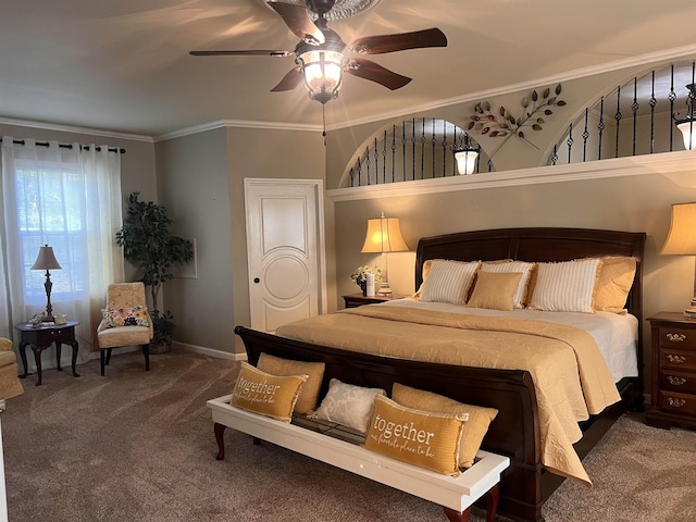 carpeted bedroom with baseboards, ceiling fan, and crown molding