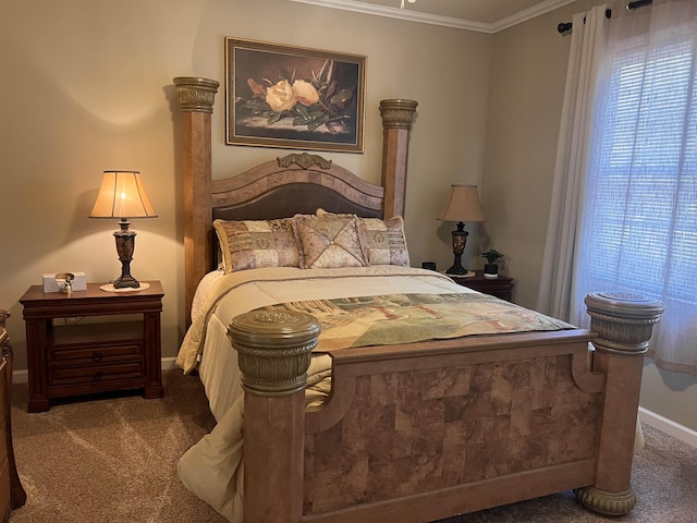 bedroom featuring baseboards, ornamental molding, and carpet