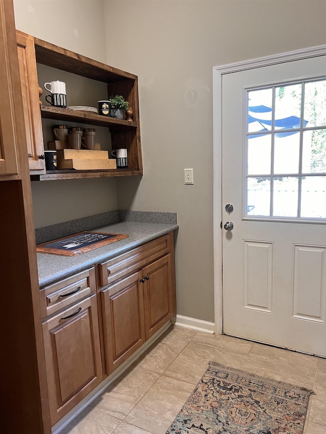 doorway with baseboards