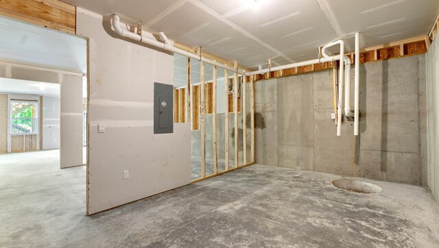 basement featuring electric panel