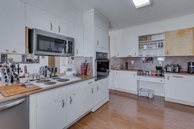 129 Canty, Gaffney, SC 29341 - kitchen with backsplash, open shelves, appliances with stainless steel finishes, white cabinets, and light wood-style floors
