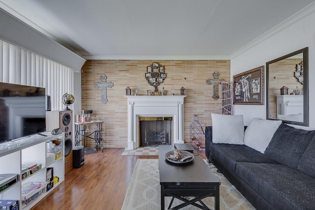 129 Canty, Gaffney, SC 29341 - living room featuring a fireplace with flush hearth, crown molding, and wood finished floors