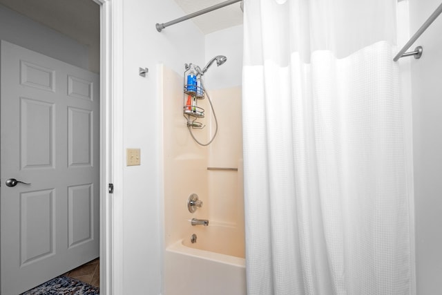 bathroom featuring shower / tub combo with curtain