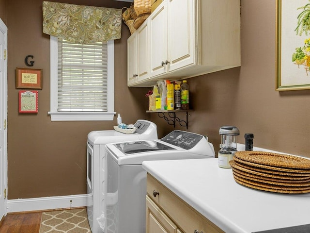 394 Old S, Duncan, SC 29334 - laundry area with cabinet space, independent washer and dryer, baseboards, and wood finished floors