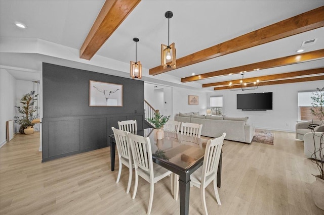 2046 Bluet, Woodruff, SC 29388 - dining space with baseboards, visible vents, light wood-type flooring, and beamed ceiling