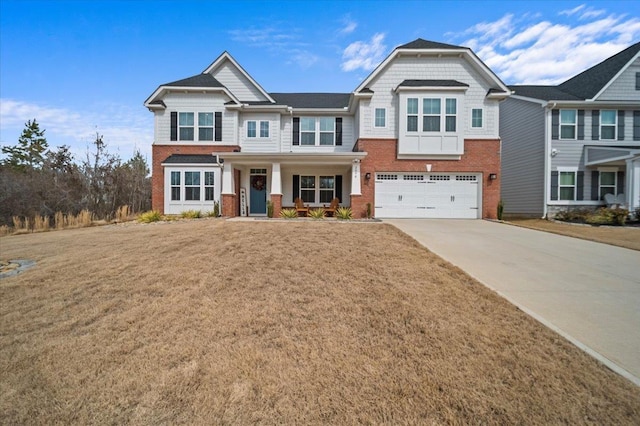 2046 Bluet, Woodruff, SC 29388 - craftsman-style house featuring concrete driveway, a garage, a front lawn, and brick siding