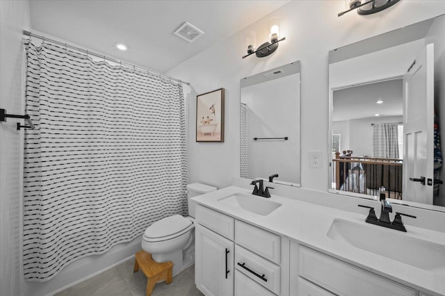 2046 Bluet, Woodruff, SC 29388 - bathroom featuring tile patterned flooring, visible vents, a sink, and toilet