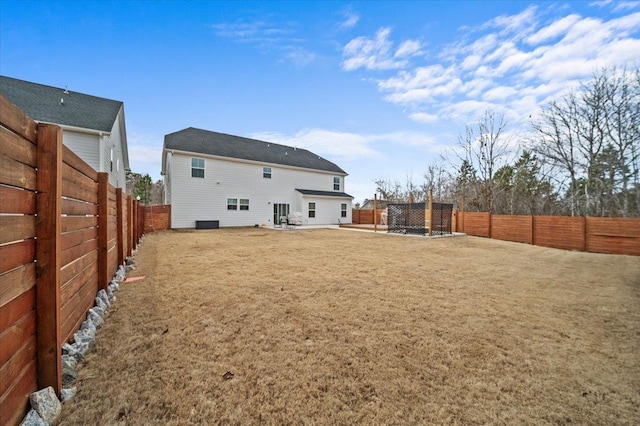 2046 Bluet, Woodruff, SC 29388 - back of property featuring a patio area, a fenced backyard, and a lawn
