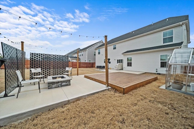 2046 Bluet, Woodruff, SC 29388 - back of house with a patio area, a deck, fence, and an outdoor fire pit