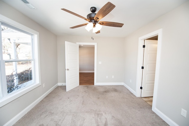 100 Winterhaven, Spartanburg, SC 29301 - unfurnished room featuring visible vents, ceiling fan, light colored carpet, and baseboards