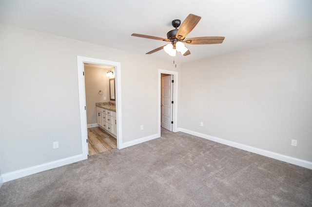 100 Winterhaven, Spartanburg, SC 29301 - unfurnished bedroom with ensuite bath, baseboards, ceiling fan, and light colored carpet