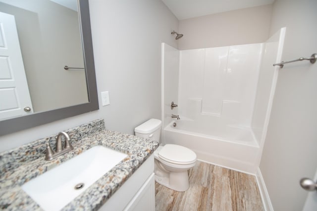 100 Winterhaven, Spartanburg, SC 29301 - full bath with toilet, wood finished floors, vanity, and shower / bathtub combination