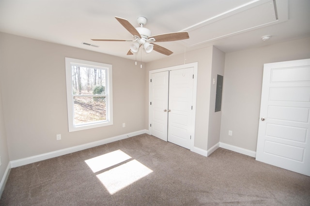 100 Winterhaven, Spartanburg, SC 29301 - unfurnished bedroom with carpet, visible vents, and attic access