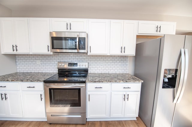 100 Winterhaven, Spartanburg, SC 29301 - kitchen with white cabinetry and appliances with stainless steel finishes