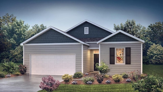 view of front of home featuring a garage and driveway
