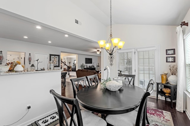 dining space with an inviting chandelier, vaulted ceiling, visible vents, stairway, and dark wood-style flooring