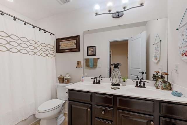 full bath featuring toilet, double vanity, a sink, and a shower with curtain