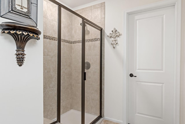full bathroom featuring a shower stall