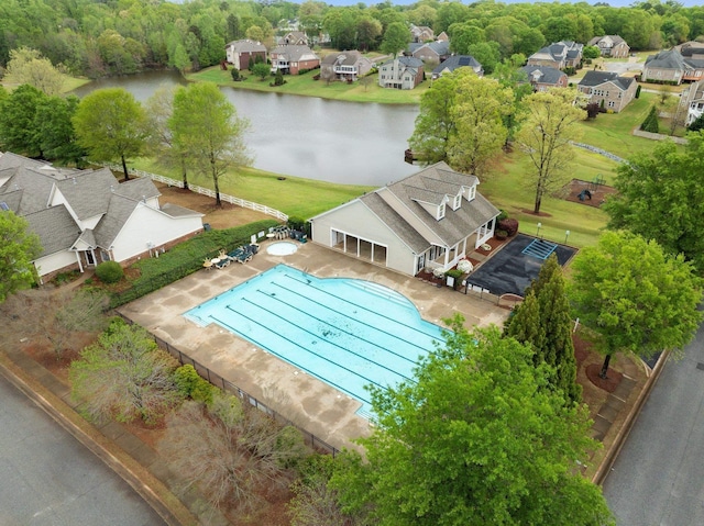 aerial view with a water view and a residential view