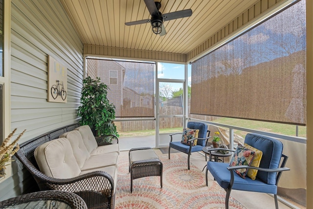 sunroom with outdoor lounge area and ceiling fan
