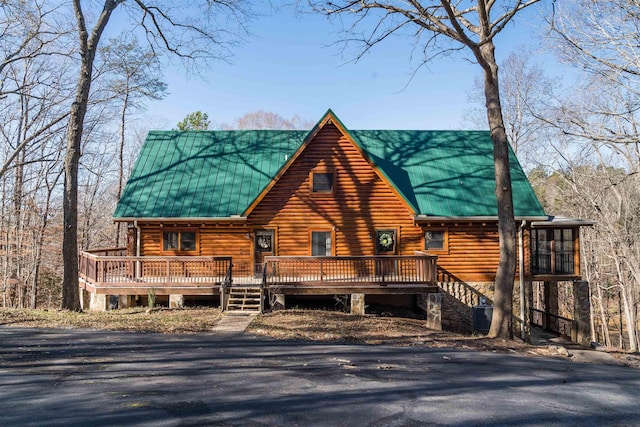 144 Lakeshore, Chesnee, SC 29323 - cabin with metal roof, a deck, and log exterior