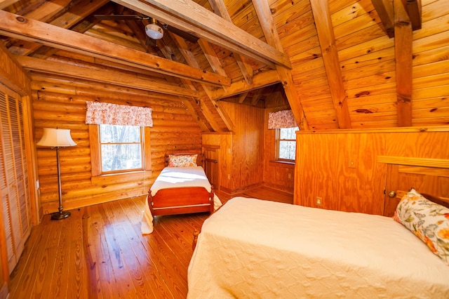 144 Lakeshore, Chesnee, SC 29323 - bedroom featuring log walls, wood-type flooring, wood ceiling, and lofted ceiling with beams