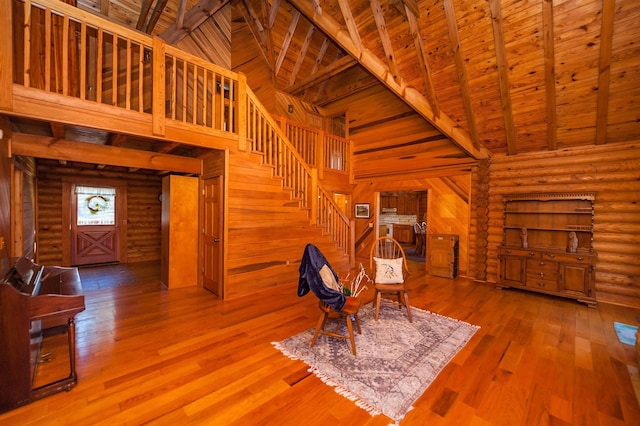 144 Lakeshore, Chesnee, SC 29323 - sitting room with wooden ceiling, hardwood / wood-style flooring, beam ceiling, stairs, and high vaulted ceiling