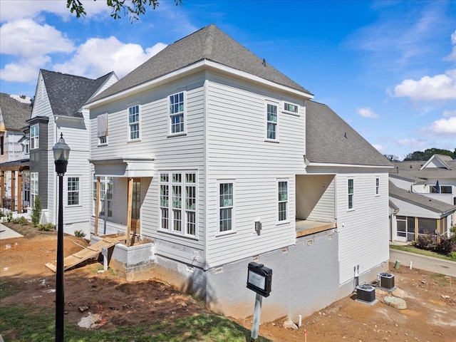 138 Silver Hl, Spartanburg, SC 29302 - back of property featuring roof with shingles and central air condition unit