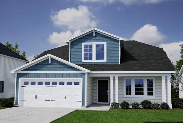 1419 Macedonia, Gaffney, SC 29341 - view of front of home with driveway, a shingled roof, an attached garage, and a front yard