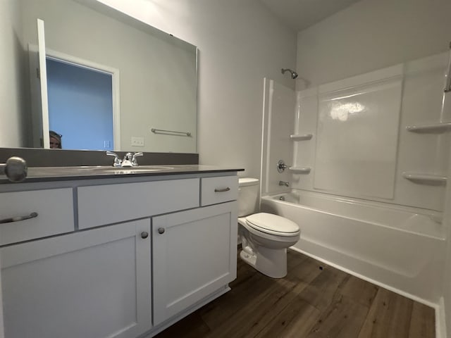 1419 Macedonia, Gaffney, SC 29341 - full bathroom featuring wood finished floors, vanity, shower / bath combination, and toilet
