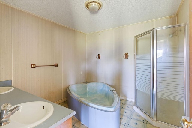 221 Lakeview, Liberty, SC 29657 - full bath with a bath, a textured ceiling, a shower stall, vanity, and tile patterned floors