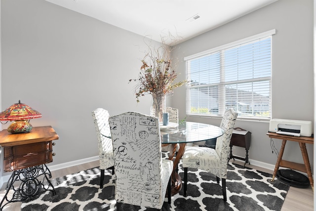 122 Aleppo, Greer, SC 29651 - dining space with visible vents, a wealth of natural light, and wood finished floors