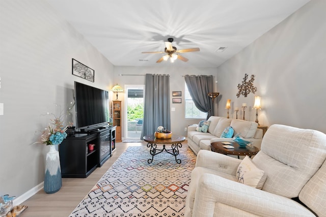 122 Aleppo, Greer, SC 29651 - living room featuring light wood-style floors, baseboards, visible vents, and a ceiling fan