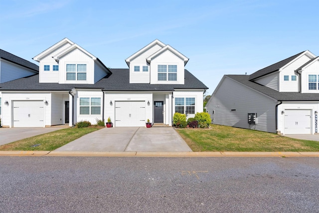 122 Aleppo, Greer, SC 29651 - view of front facade with concrete driveway and a front lawn